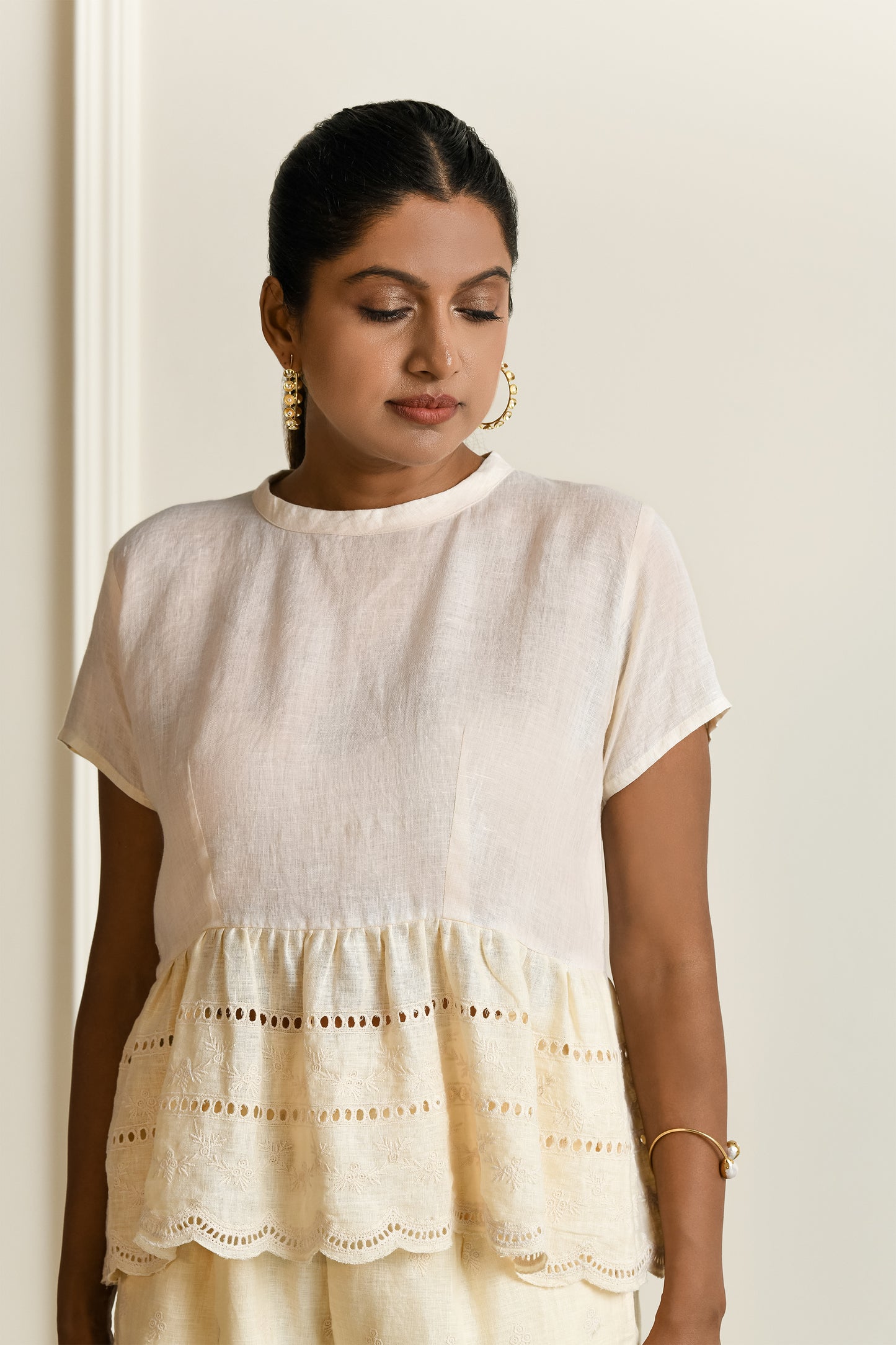 Iris embroidered linen top